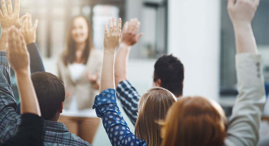 People raising their hands