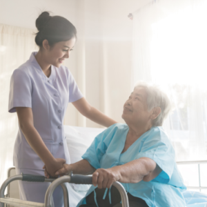 Nurse smiling to a woman